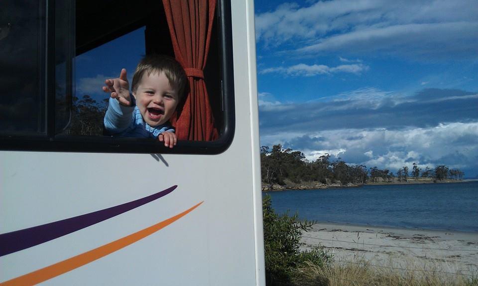 5 Reasons Kids Love Motorhome Adventures Happy Kid in a Motorhome